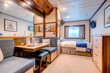 Category BX Deluxe DECK 1 Midship | CABIN TYPE: Stateroom | 188 SQ FT